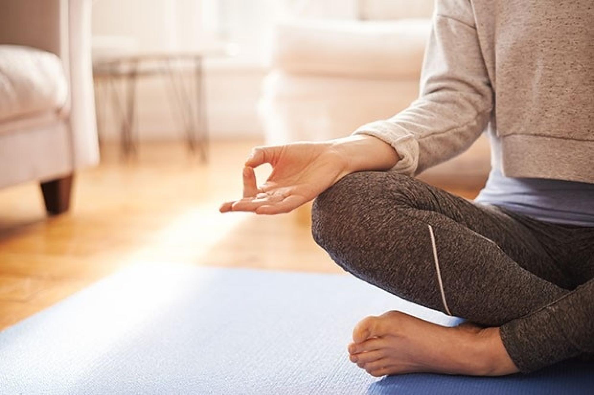 Woman meditating Getty Images 957709278 67ae765